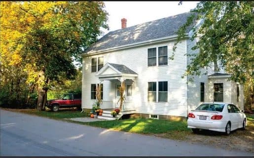 The white Dyer House duplex