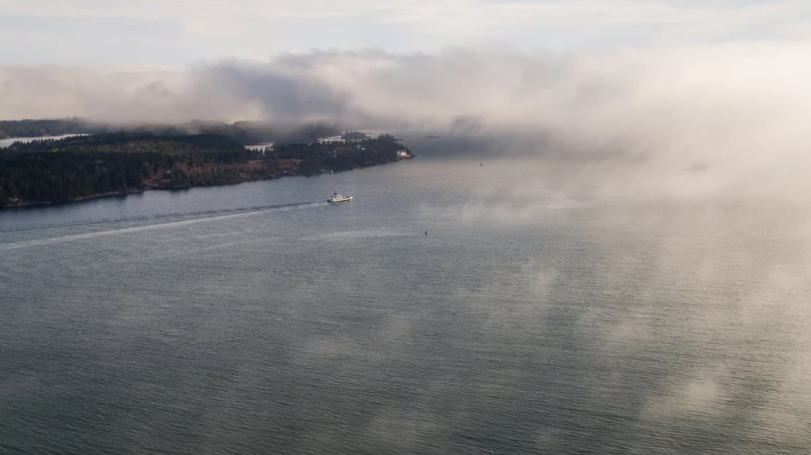 The North Haven ferry crossing the Fox Islands Thorofare in morning fog
